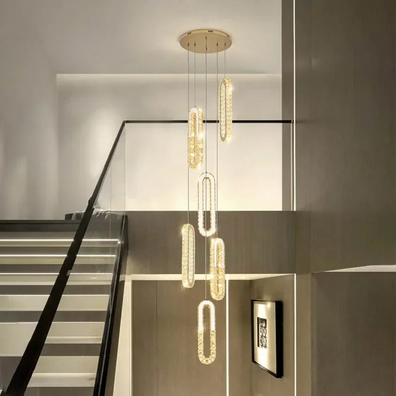 LuxeSpiral™ – Golden Crystal Cascade Chandelier