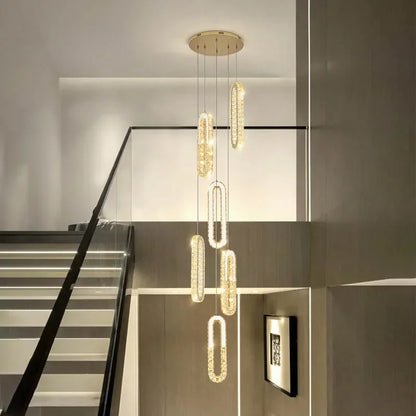 LuxeSpiral™ – Golden Crystal Cascade Chandelier